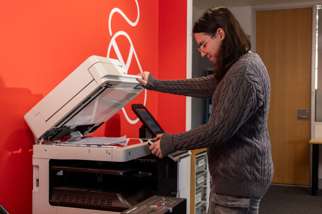 Person photocopying at THE BOWRAL CITY LIBRARY