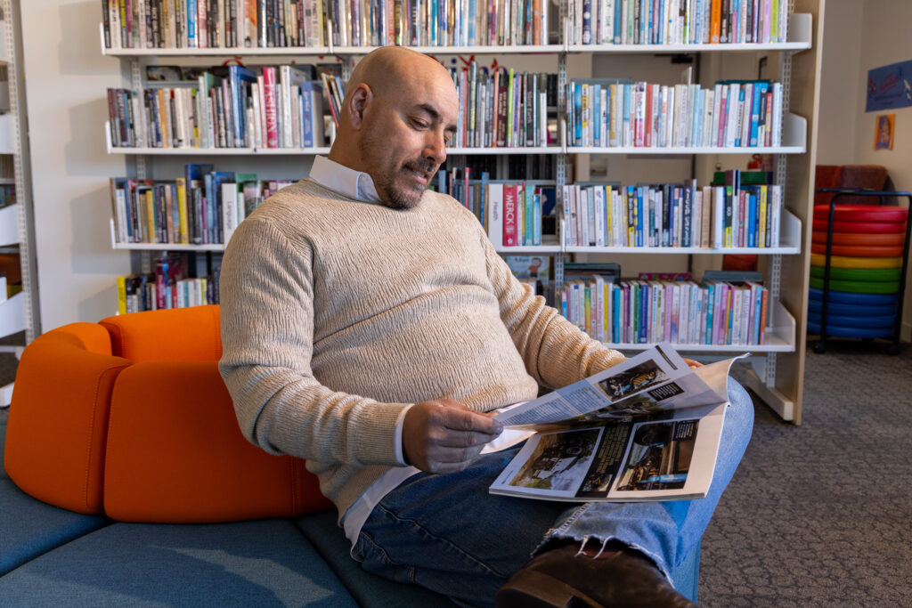 Man enjoying magazine at Moss Vale Library