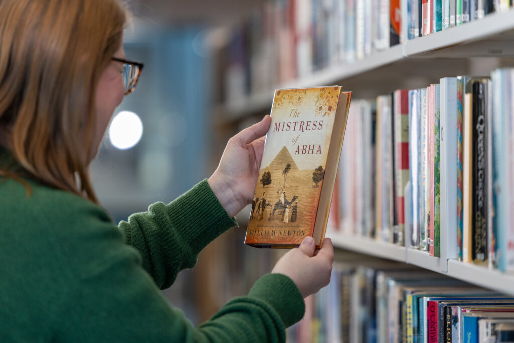 lady finding a book at at Moss Vale Library