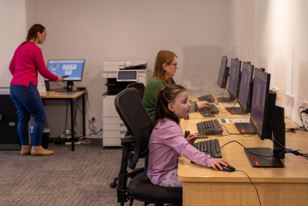 lady and girl using computers ay at Moss Vale Library