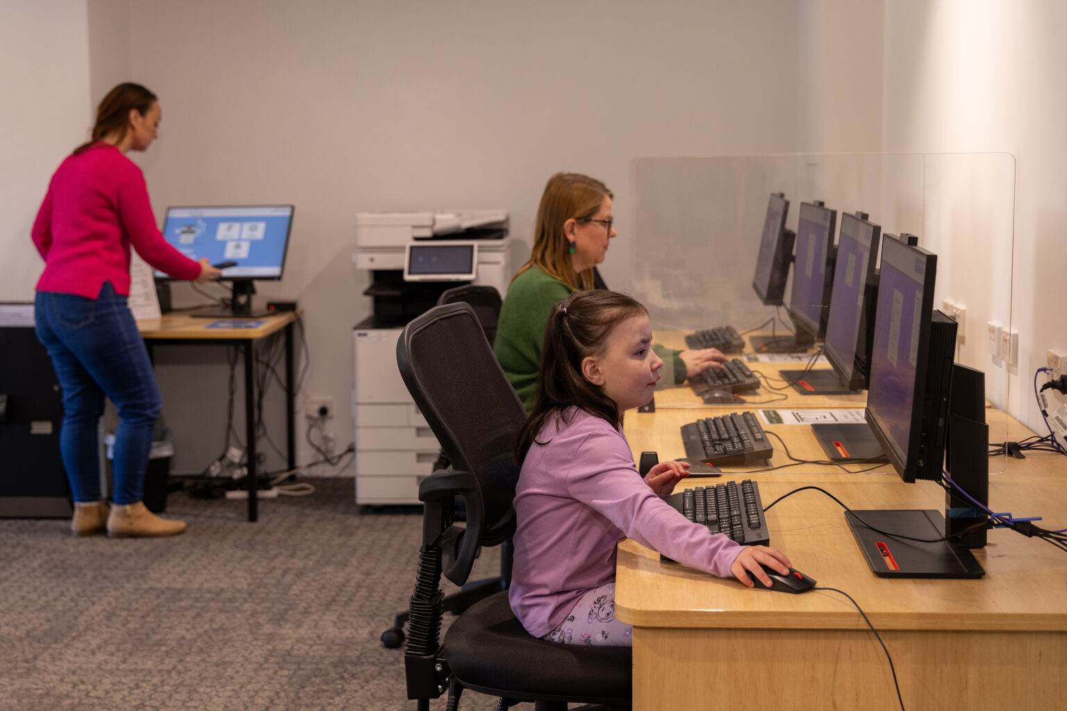 lady and girl using computers ay at Moss Vale Library