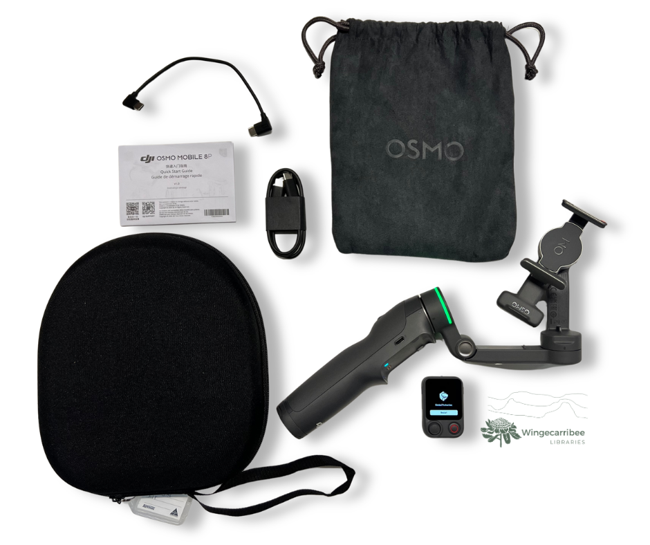 Gimbal kit on a table with all contents laid out: the gimbal tripod, power cords, carry case and protective bag.